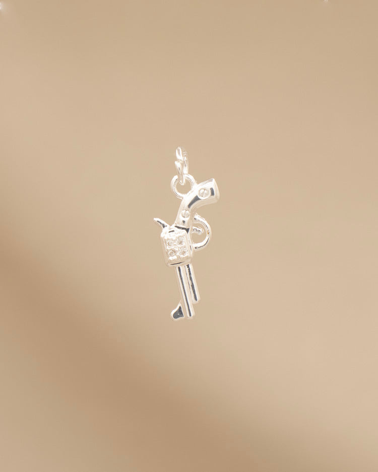 DIJE REVÓLVER BAÑO EN PLATA