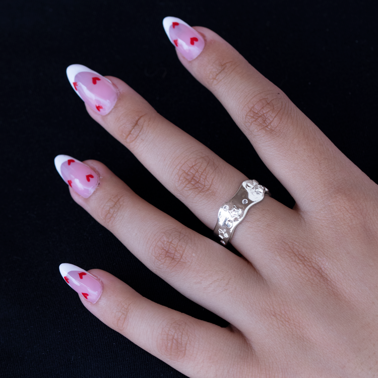 ANILLO TEXTURA DE ESTRELLAS BAÑO DE PLATA