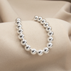 PULSERA BOLITAS 7MM BAÑO DE PLATA