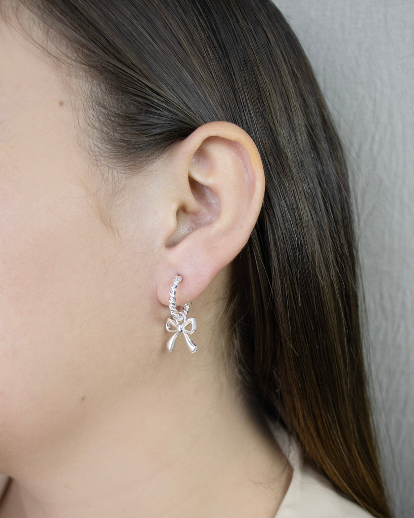 TOPO MOÑO LISO BAÑO EN PLATA