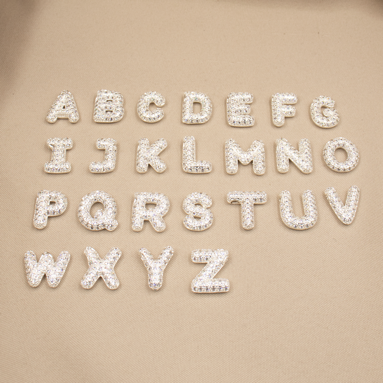 DIJE LETRA  CON CIRCONES BAÑO DE PLATA