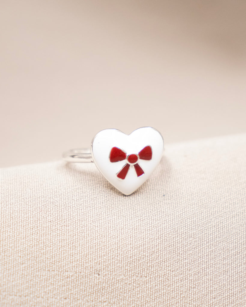 ANILLO CORAZON CON MOÑO BAÑO DE PLATA