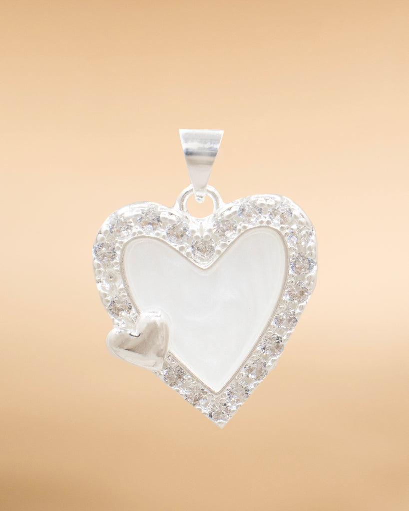 DIJE CORAZON BORDE BAÑO EN PLATA