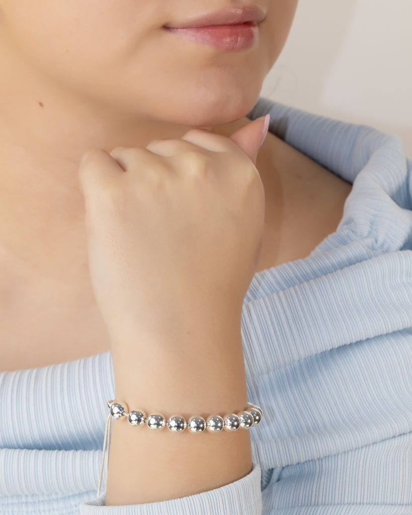 PULSERA BOLITAS 7MM BAÑO DE PLATA