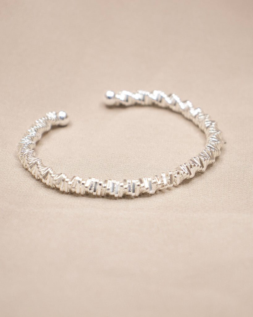 PULSERA TWIST TRIANGULAR BAÑO PLATA