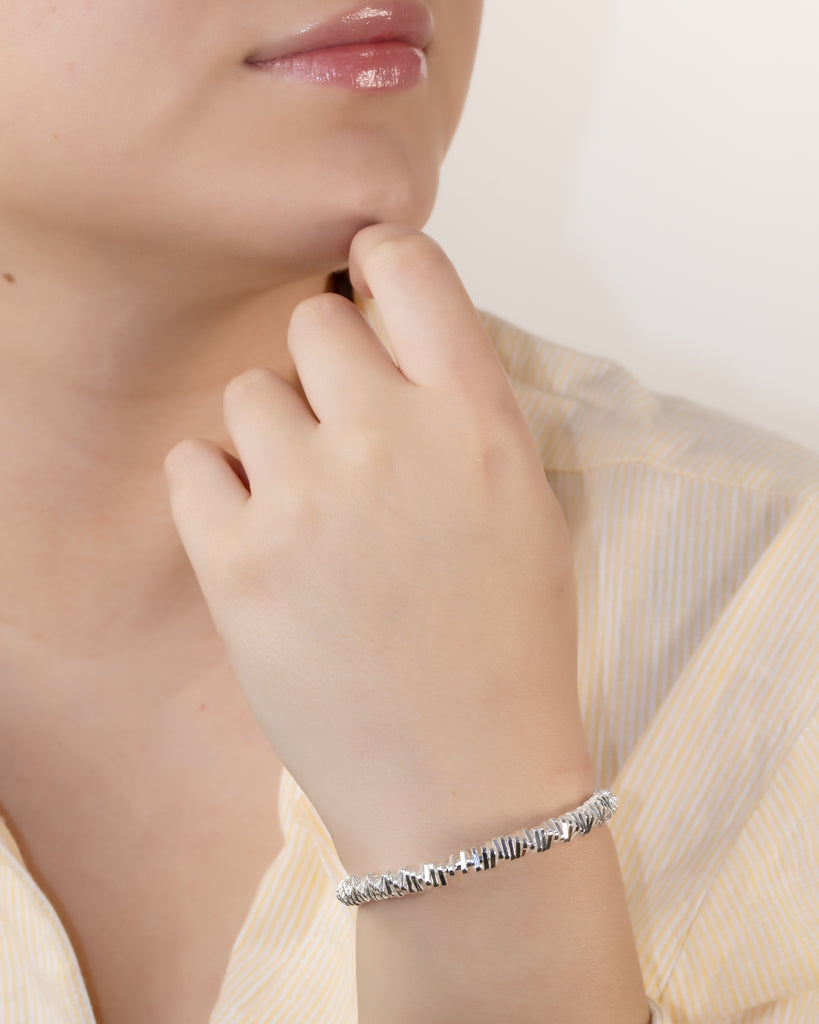 PULSERA TWIST TRIANGULAR BAÑO PLATA